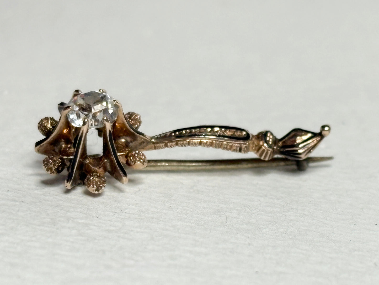 Georgian era antique 14k gold brooch with enamel and paste gem.