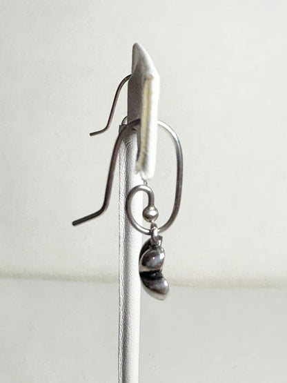 Sterling silver Pandora dangle earrings with a coiled design and a removable cherry blossom charm.