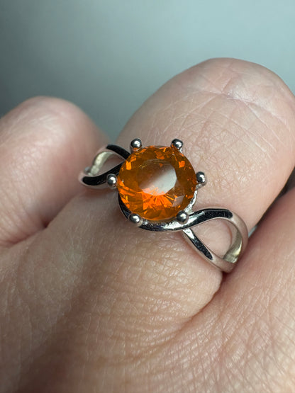 Sterling silver ring with a round Oregon fire opal.