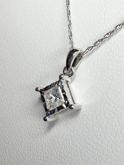 Princess cut diamond pendant necklace in 10k white gold.