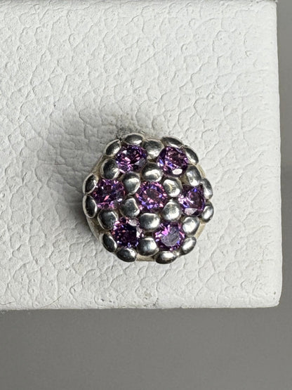 Sterling silver stud earrings with a cluster of violet purple cubic zirconia stones.