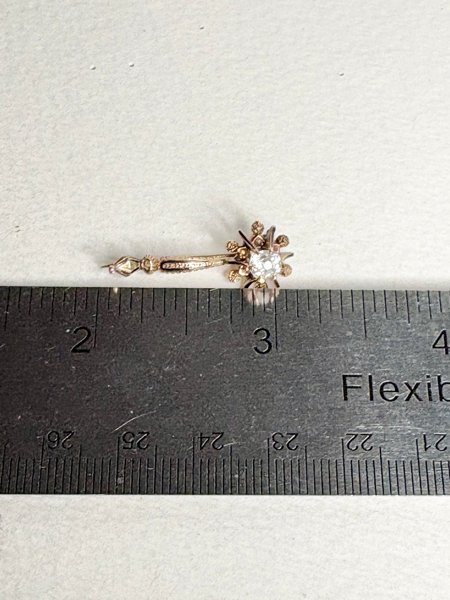 Antique 14k gold brooch with enamel and paste gem.