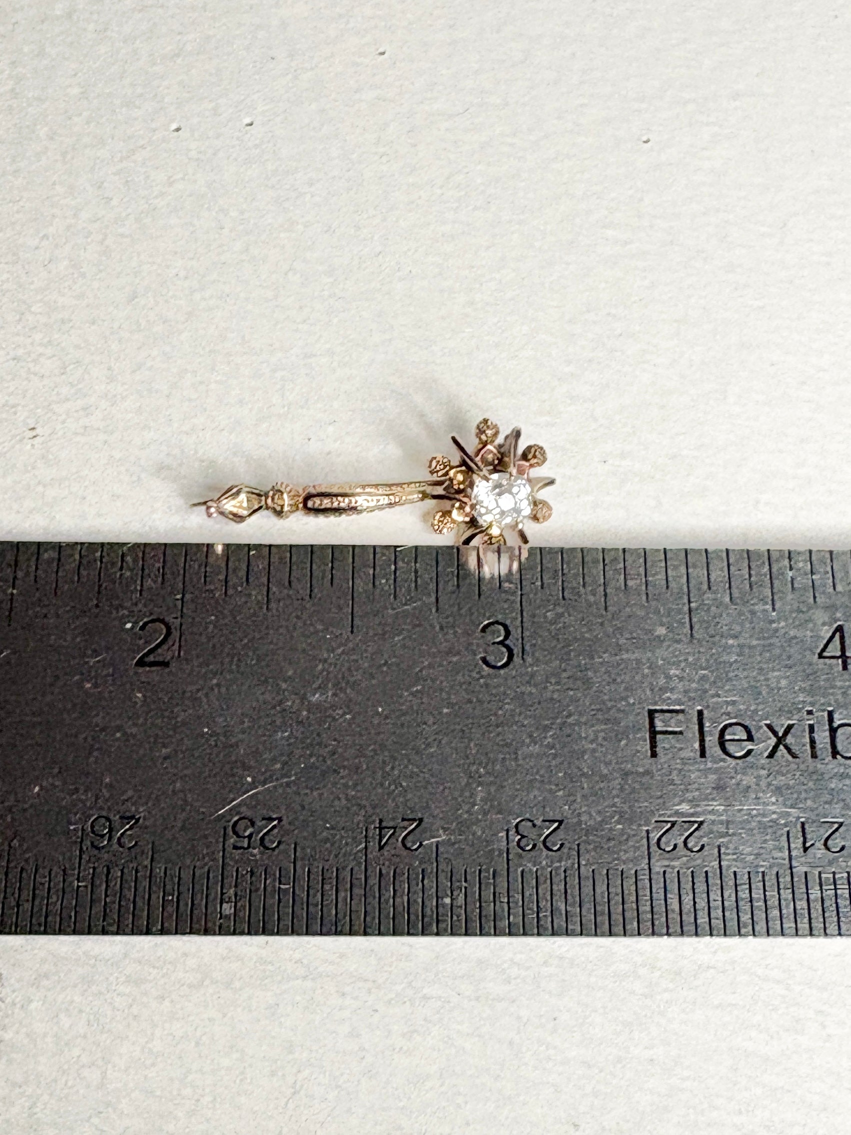 Antique 14k gold brooch with enamel and paste gem.