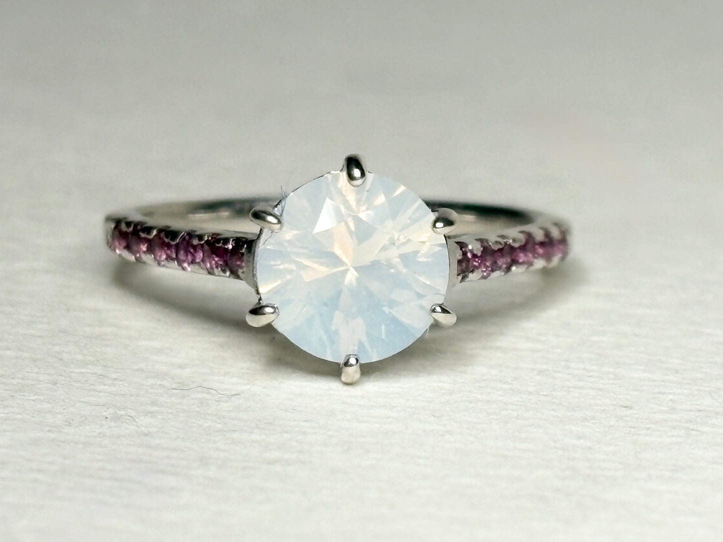 Sterling silver ring with milky white quartz and rhodolite garnets.