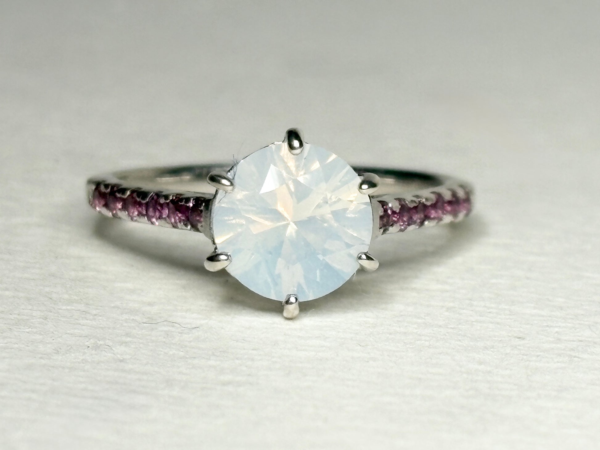 Sterling silver ring with milky white quartz and rhodolite garnets.