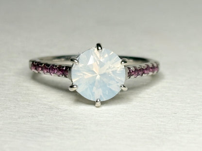 Sterling silver ring with milky white quartz and rhodolite garnets.