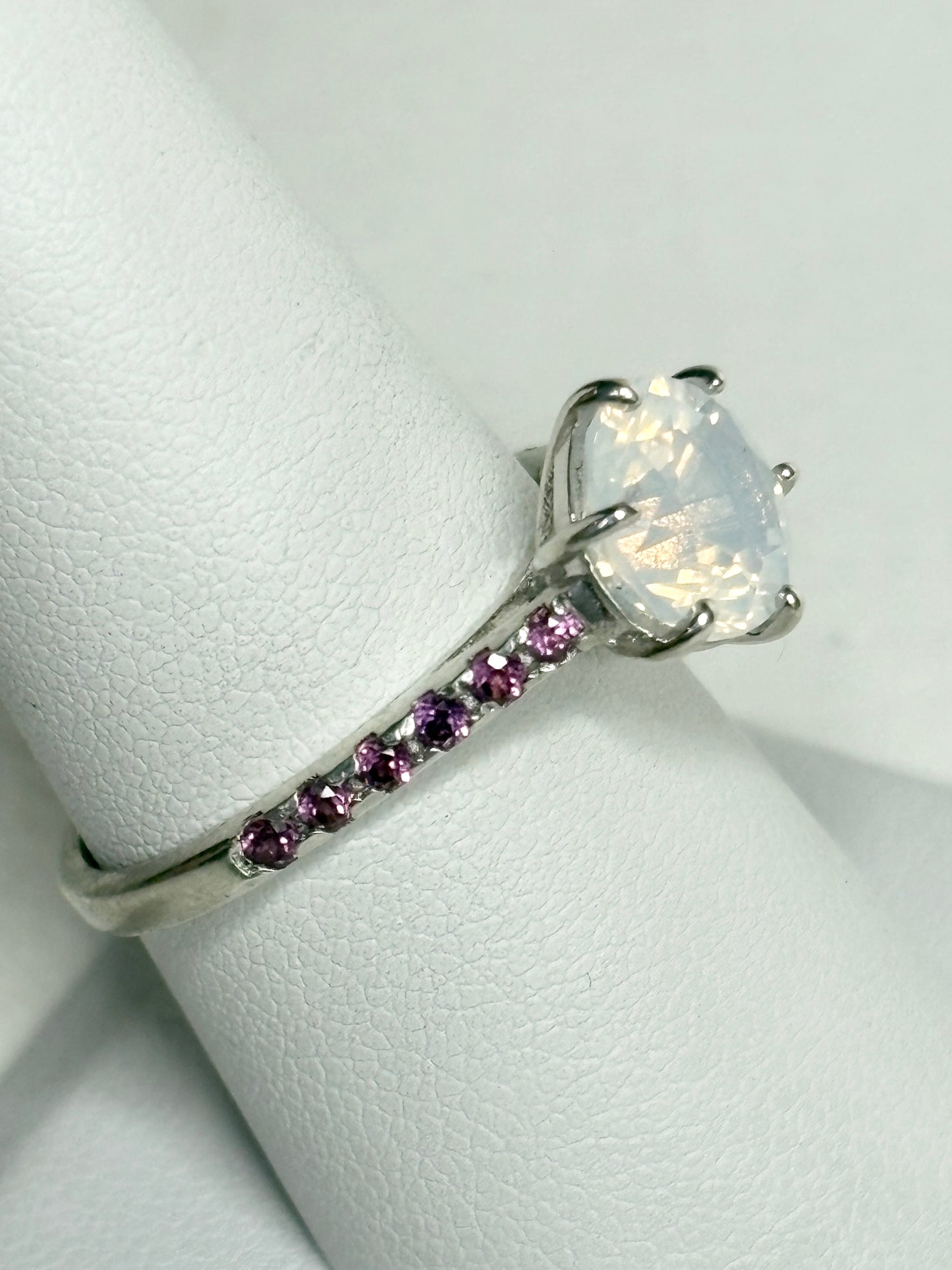 Sterling silver ring with milky white quartz and rhodolite garnets.