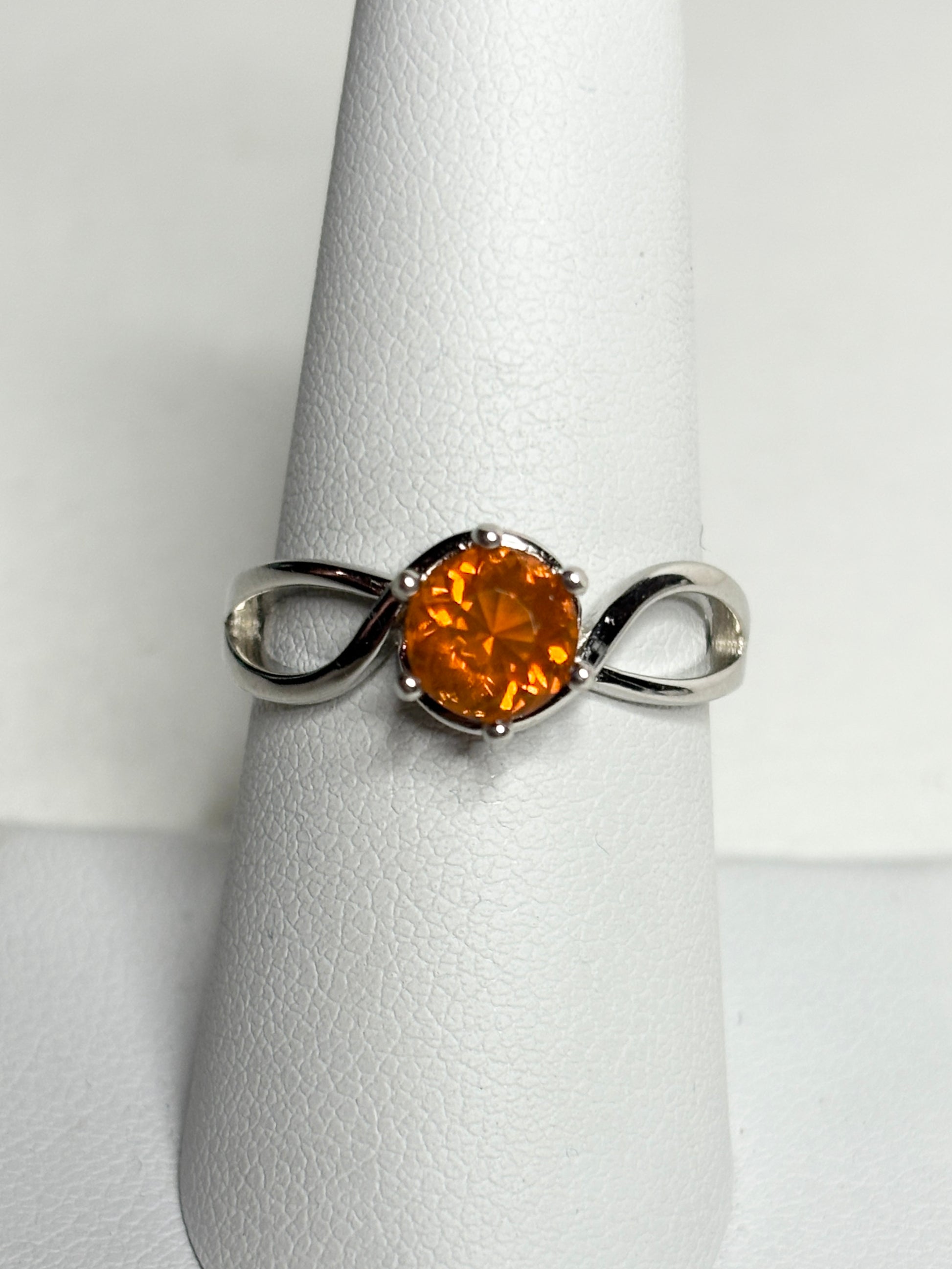 Sterling silver ring with a round Oregon fire opal.