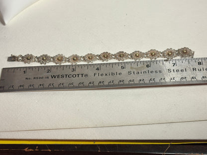 Vintage two-toned 800 silver floral daisy bracelet with gold-plated centers.