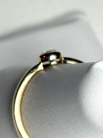 Pandora 14k gold ring with a .25ct bezel-set lab-grown diamond.