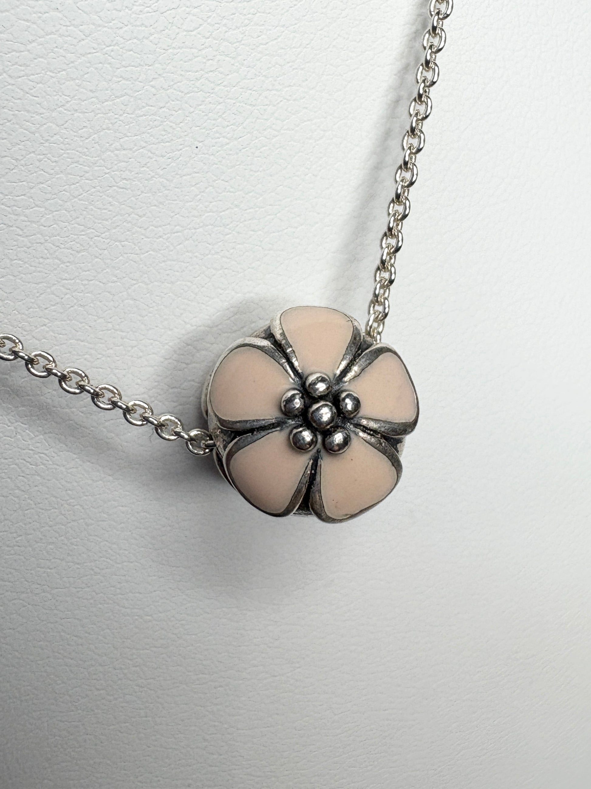 Pandora sterling silver cherry blossom stopper bead on an adjustable chain.