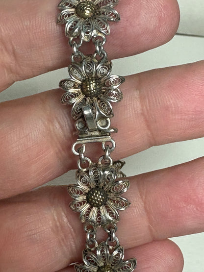 Vintage two-toned 800 silver filigree floral daisy bracelet with gold-plated centers.