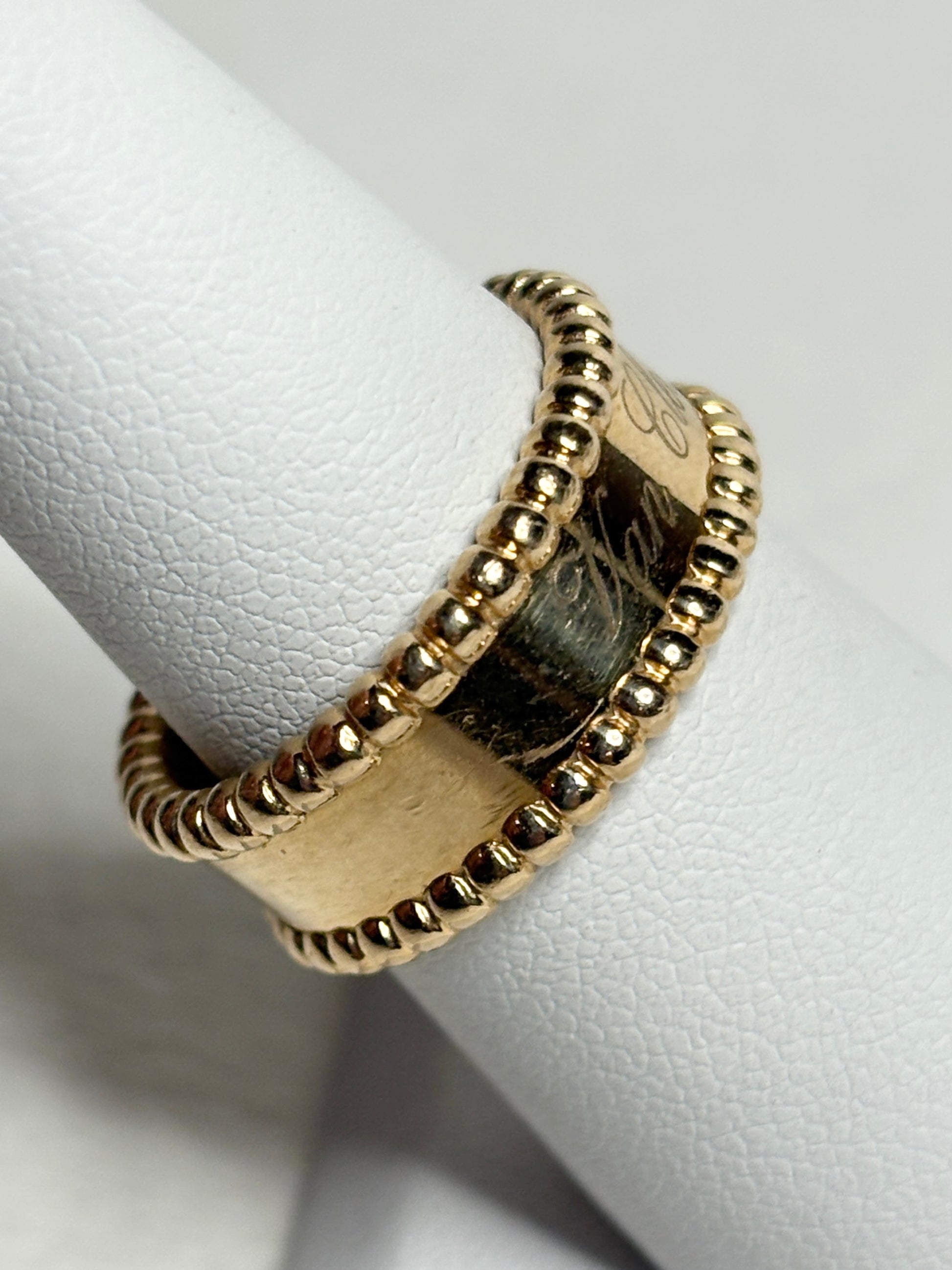 Van Cleef & Arpels Perlee Signature band ring in 18k gold.