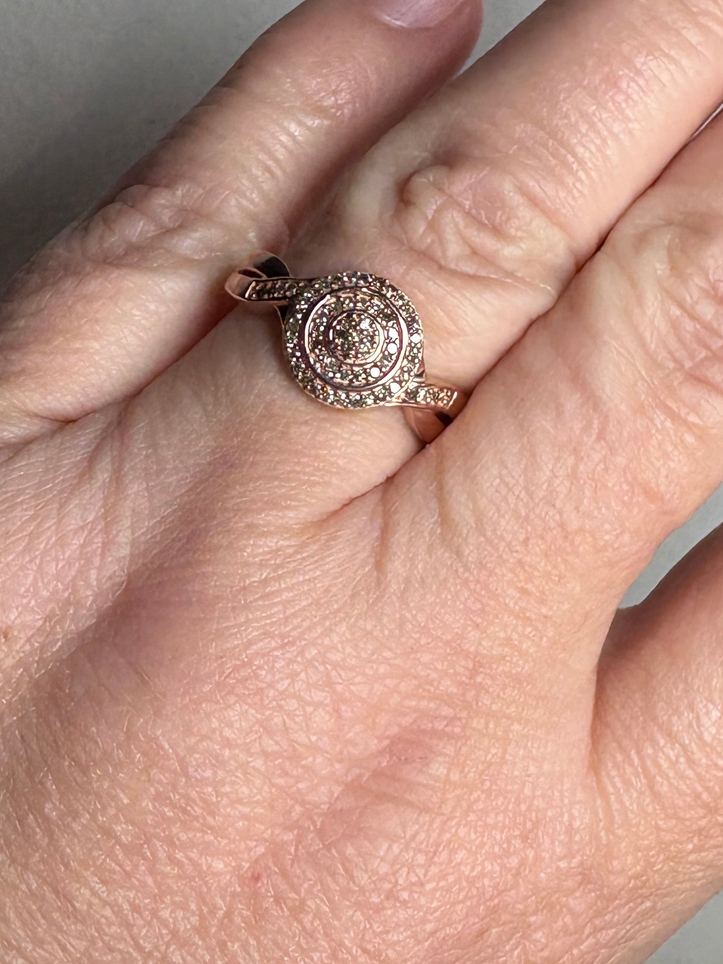 Rose gold over sterling silver ring with champagne and brown diamonds.