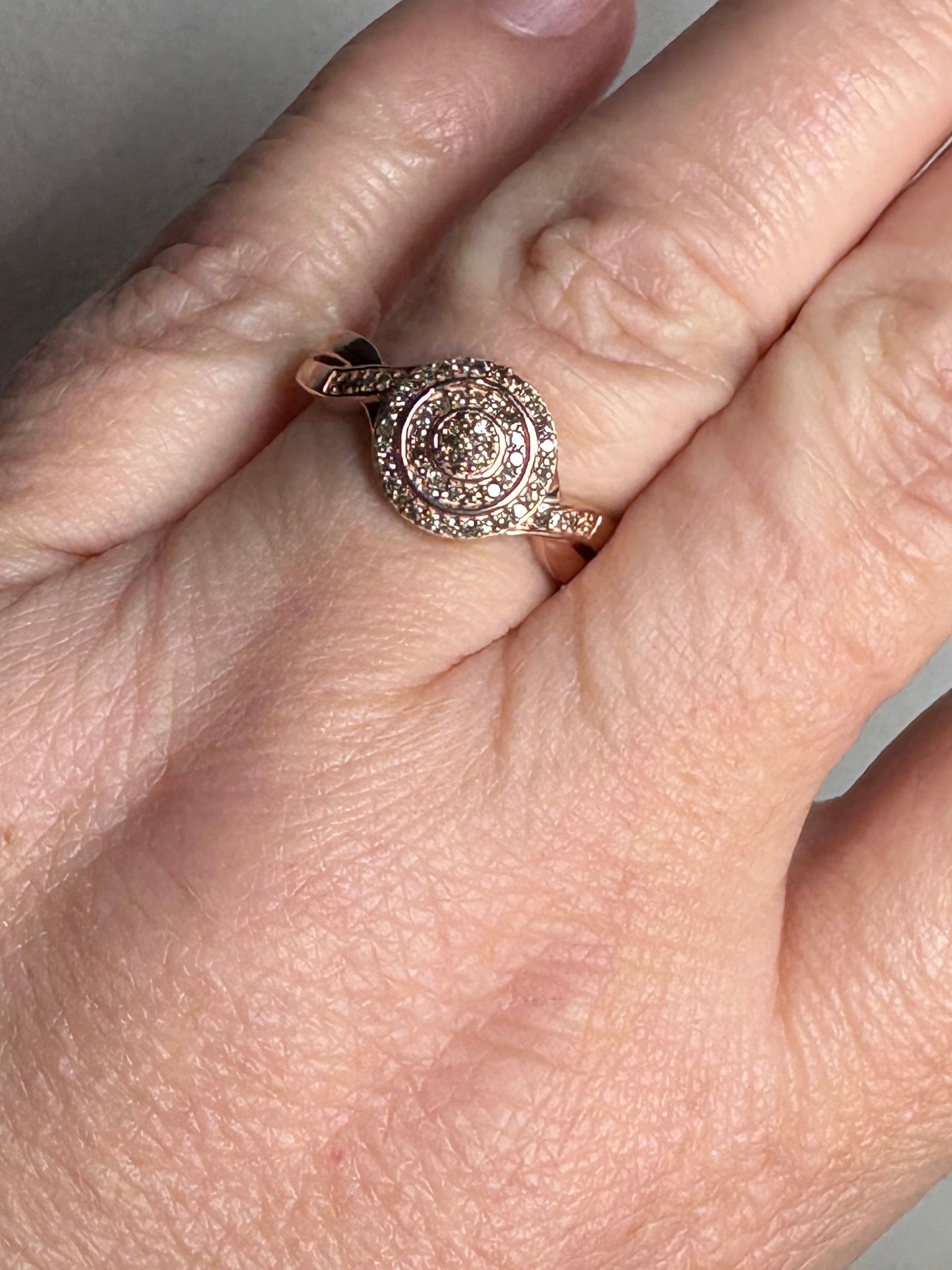 Rose gold over sterling silver ring with champagne and brown diamonds.