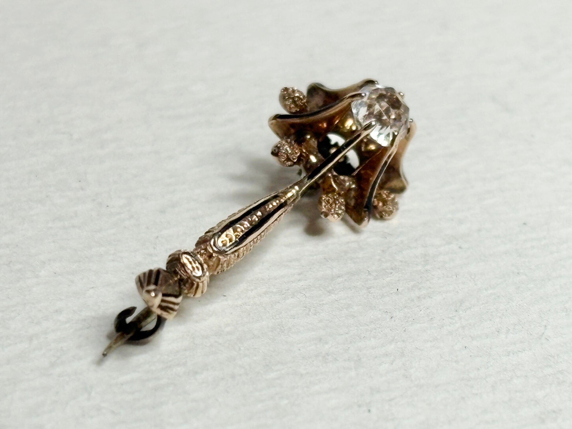 Antique 14k gold brooch with enamel and paste gem, circa 1835.