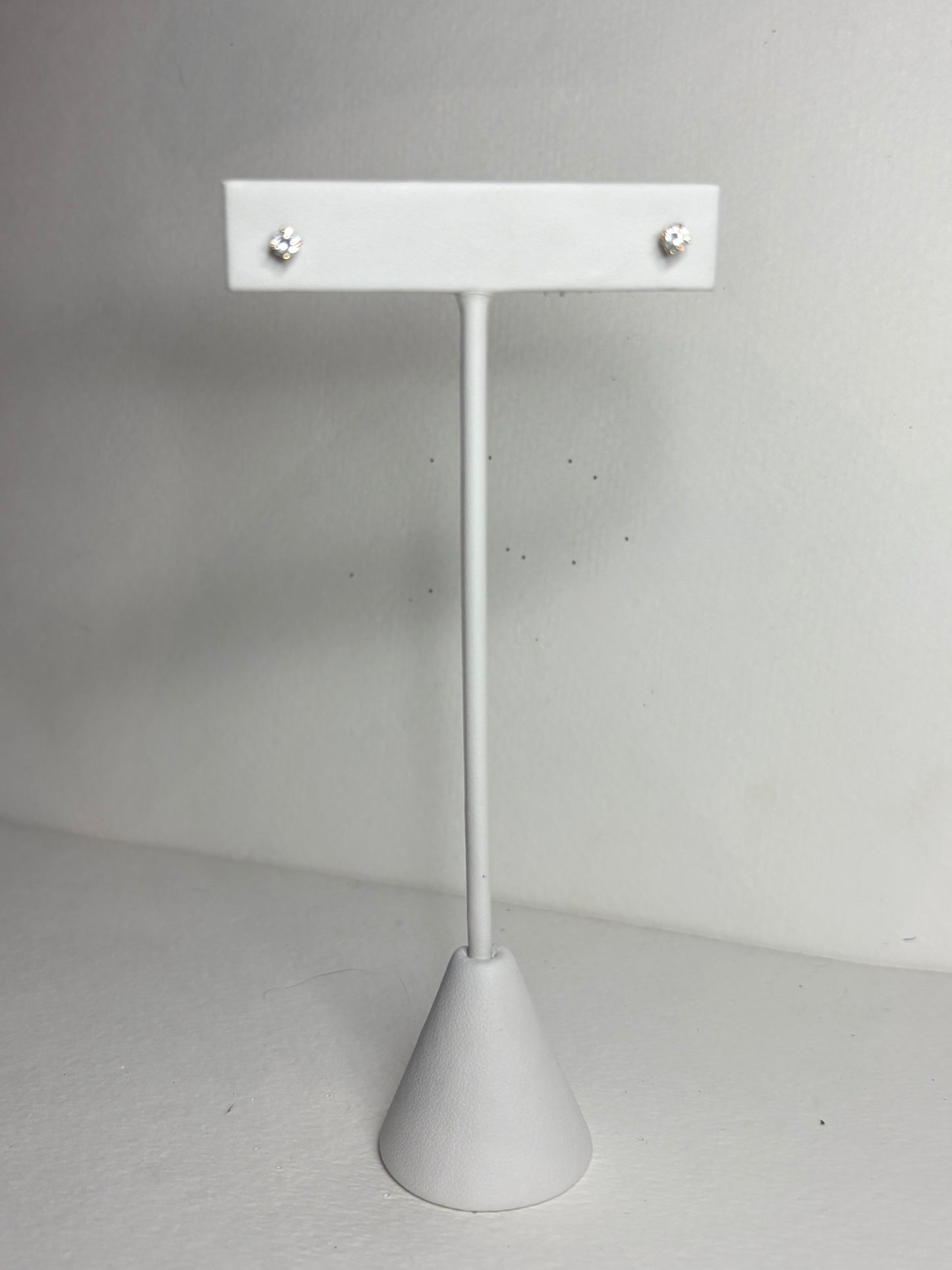 Natural simple diamond solitaire stud earrings in solid 14k gold.