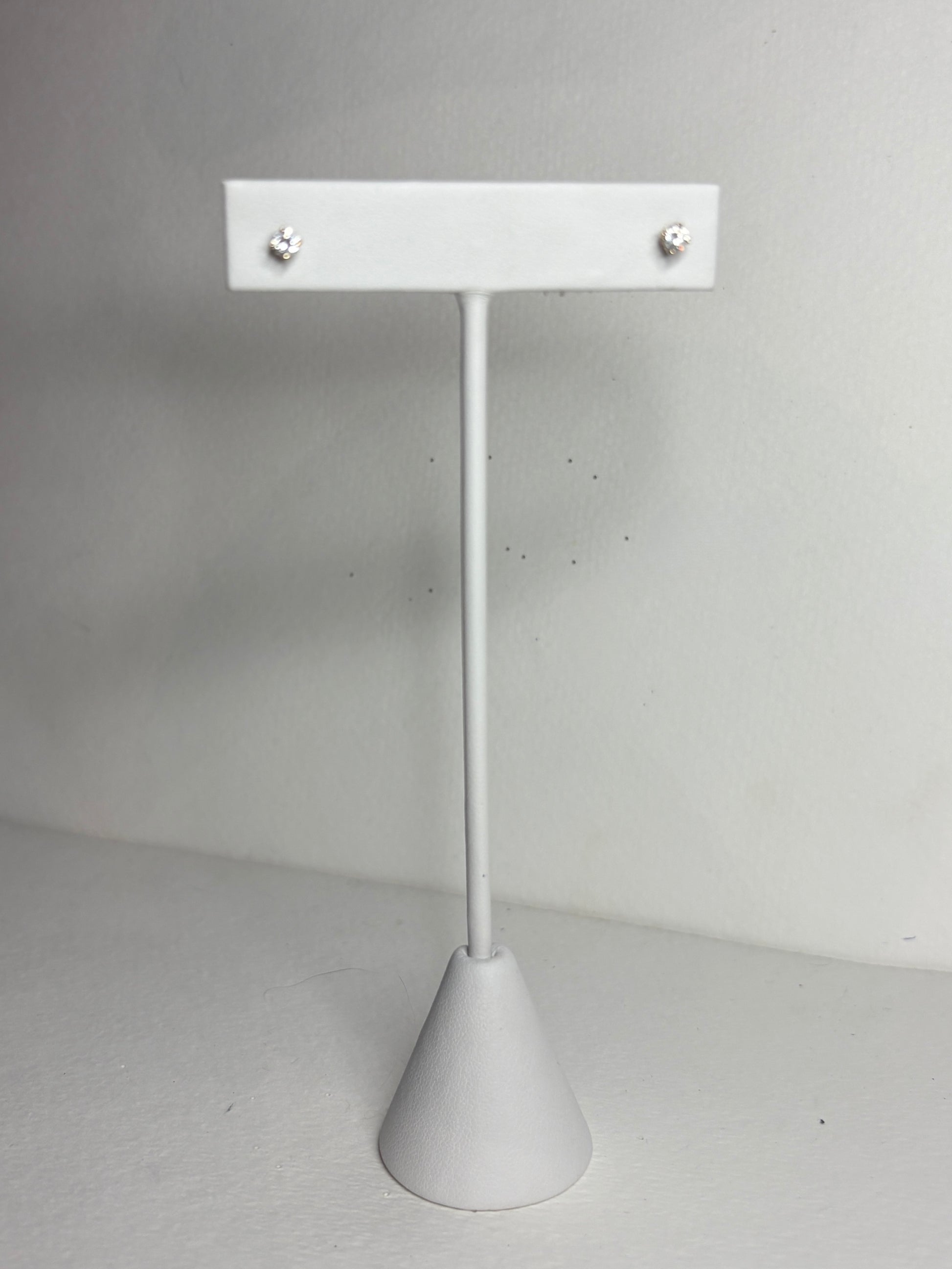 Natural simple diamond solitaire stud earrings in solid 14k gold.