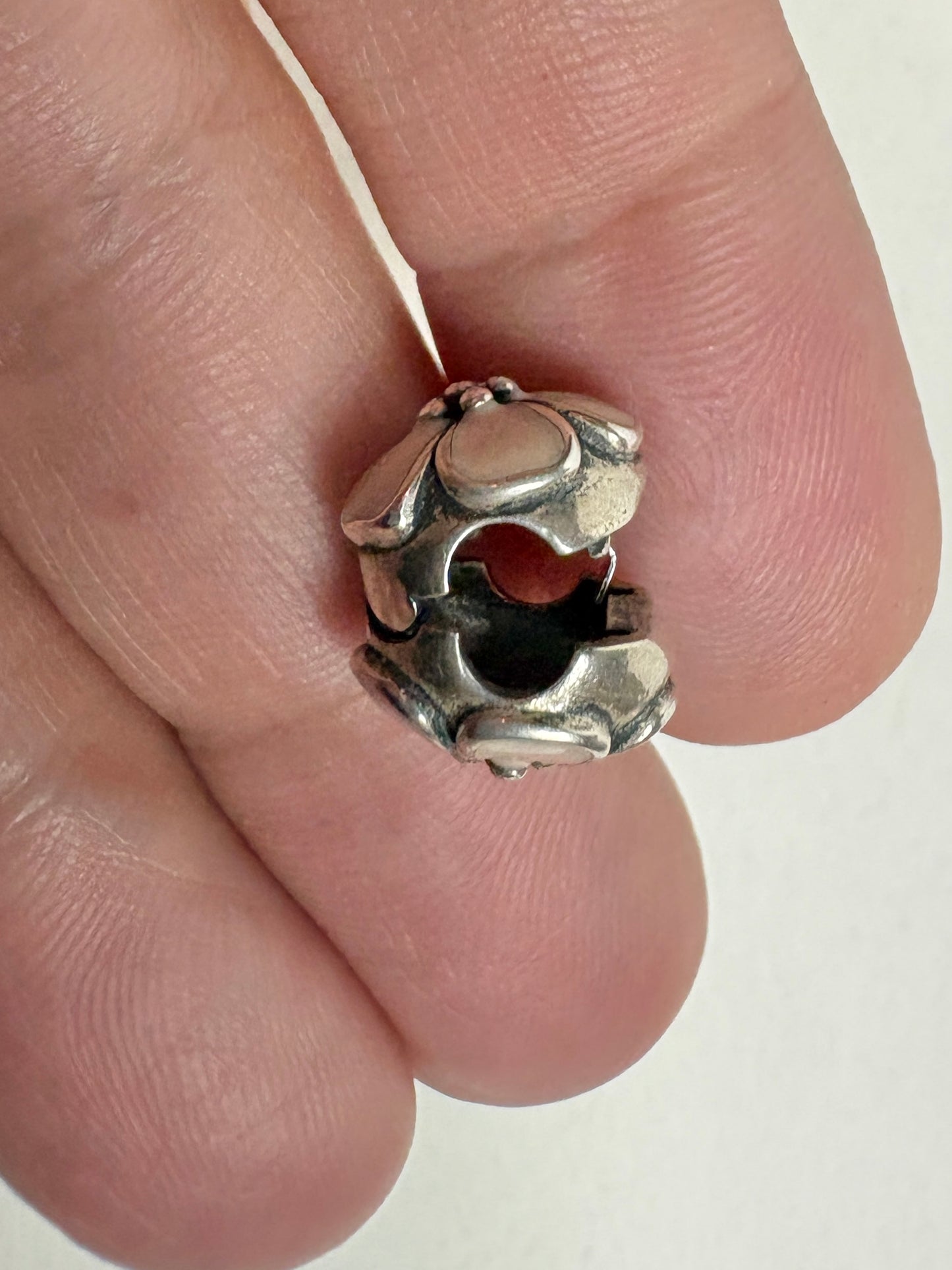 Pandora sterling silver cherry blossom stopper bead on an adjustable chain.