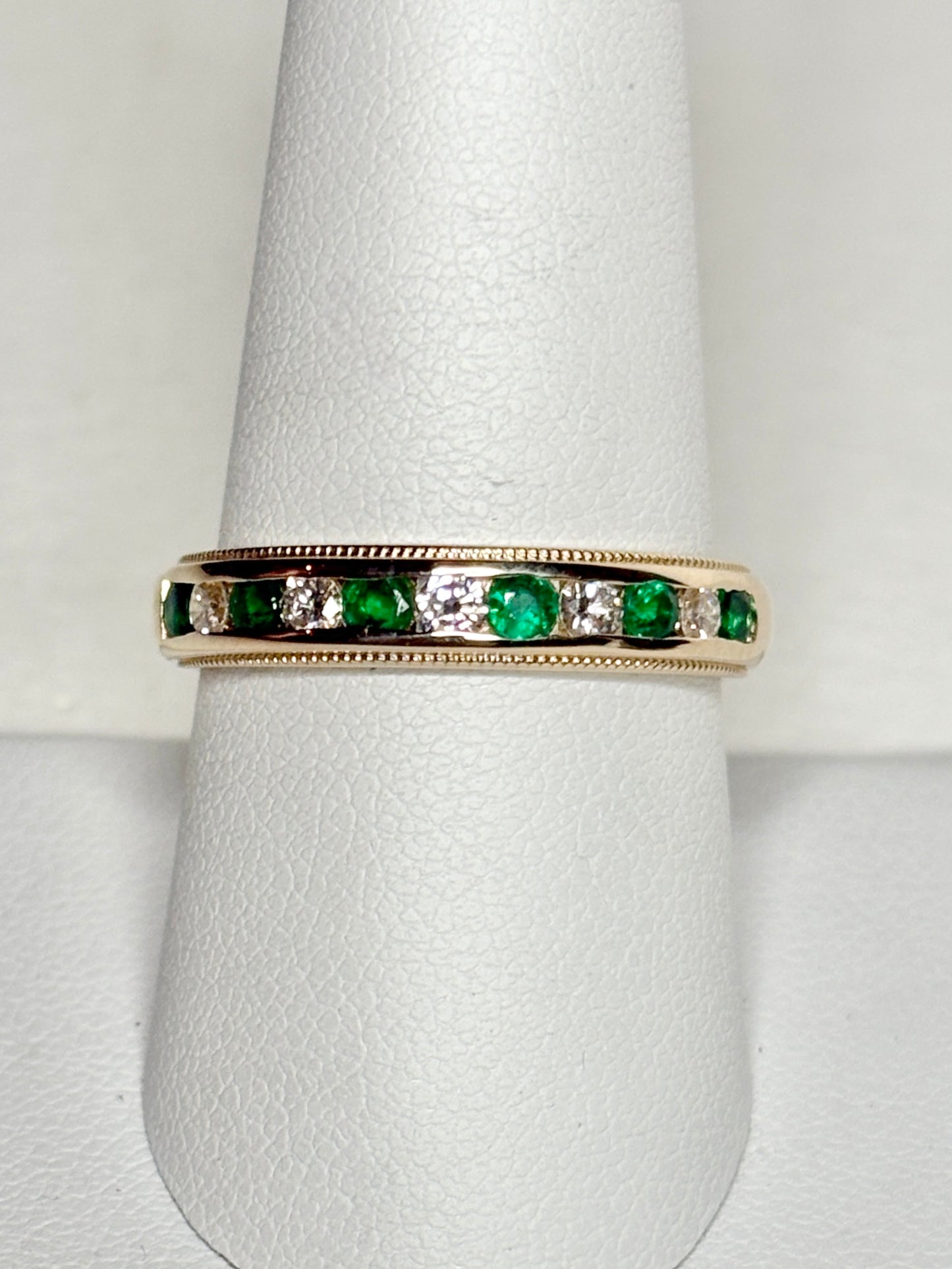 18k yellow gold band with alternating emeralds and diamonds, size 8.75.