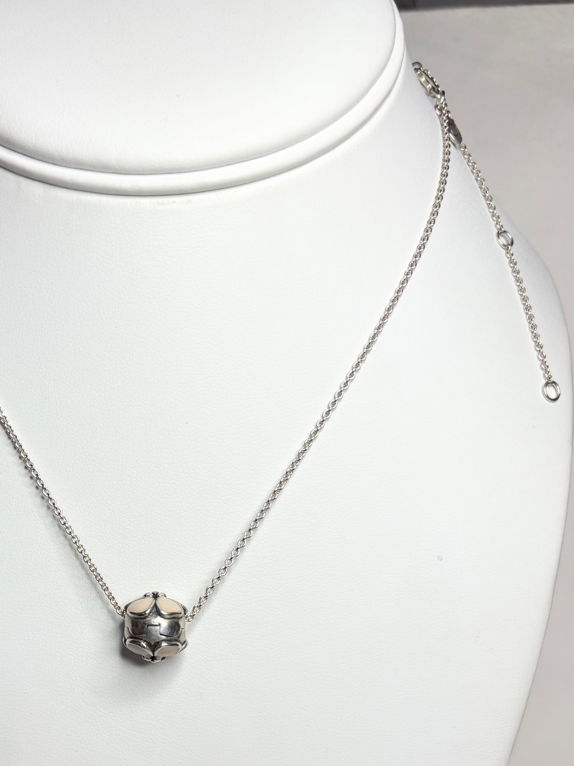 Pandora sterling silver cherry blossom stopper bead on an adjustable chain.