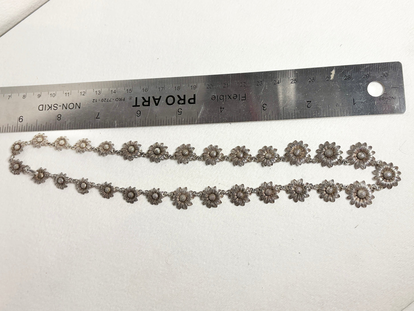 Vintage filigree floral daisy necklace in 800 silver, 18.5 inches long.