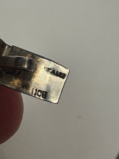 Vintage 800 silver bracelet with floral daisy design and "ITALY" stamp.