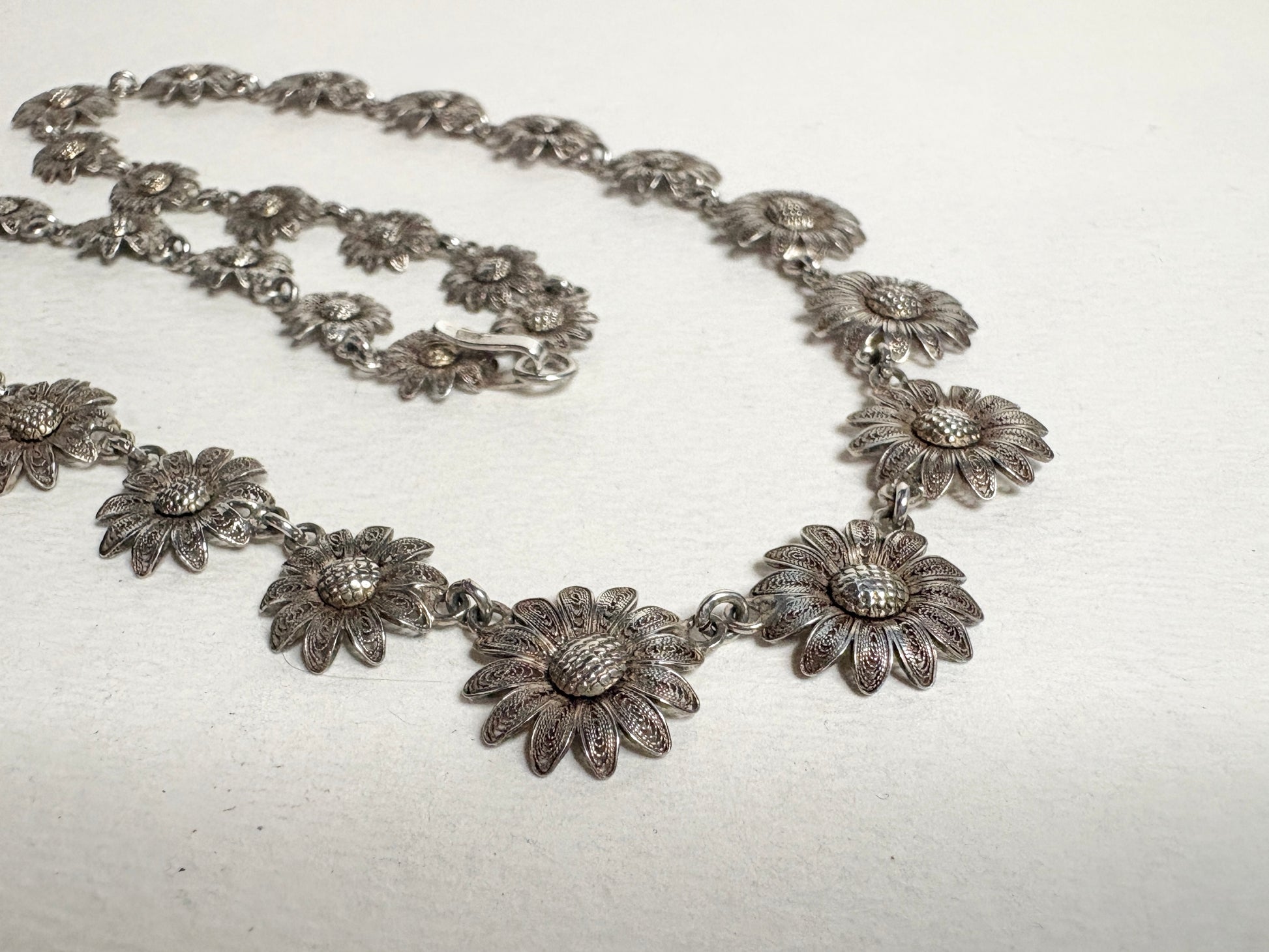 Vintage filigree floral daisy necklace in 800 silver.