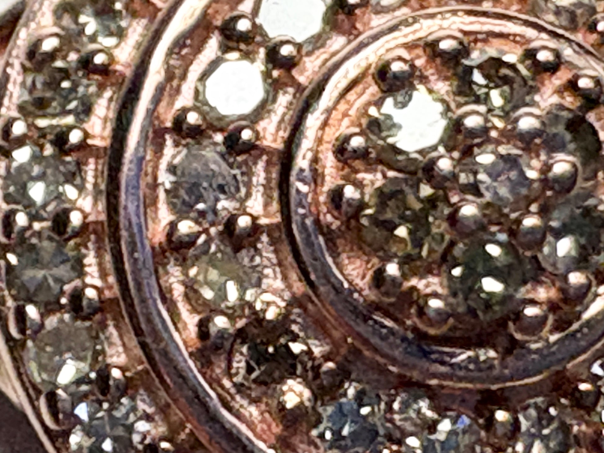 Rose gold over sterling silver ring with pave set champagne and brown diamonds.