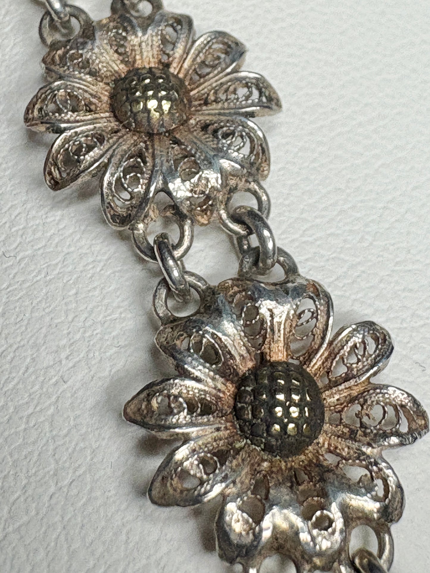Vintage two-toned filigree 800 silver floral daisy bracelet with gold-plated centers.