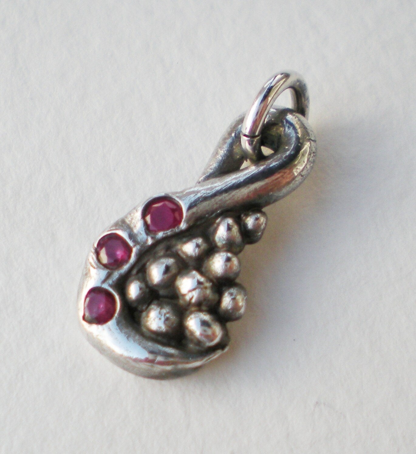 Fine solid silver natural Ruby swirl and pebble pendant