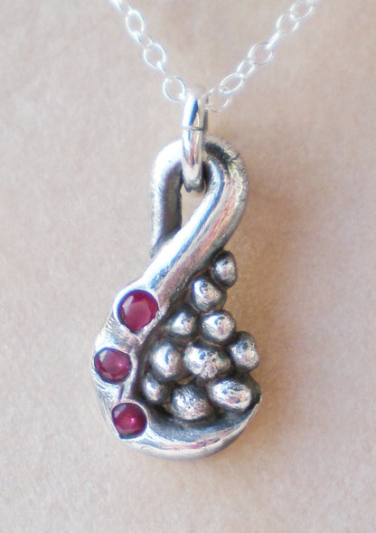 Fine solid silver natural Ruby swirl and pebble pendant