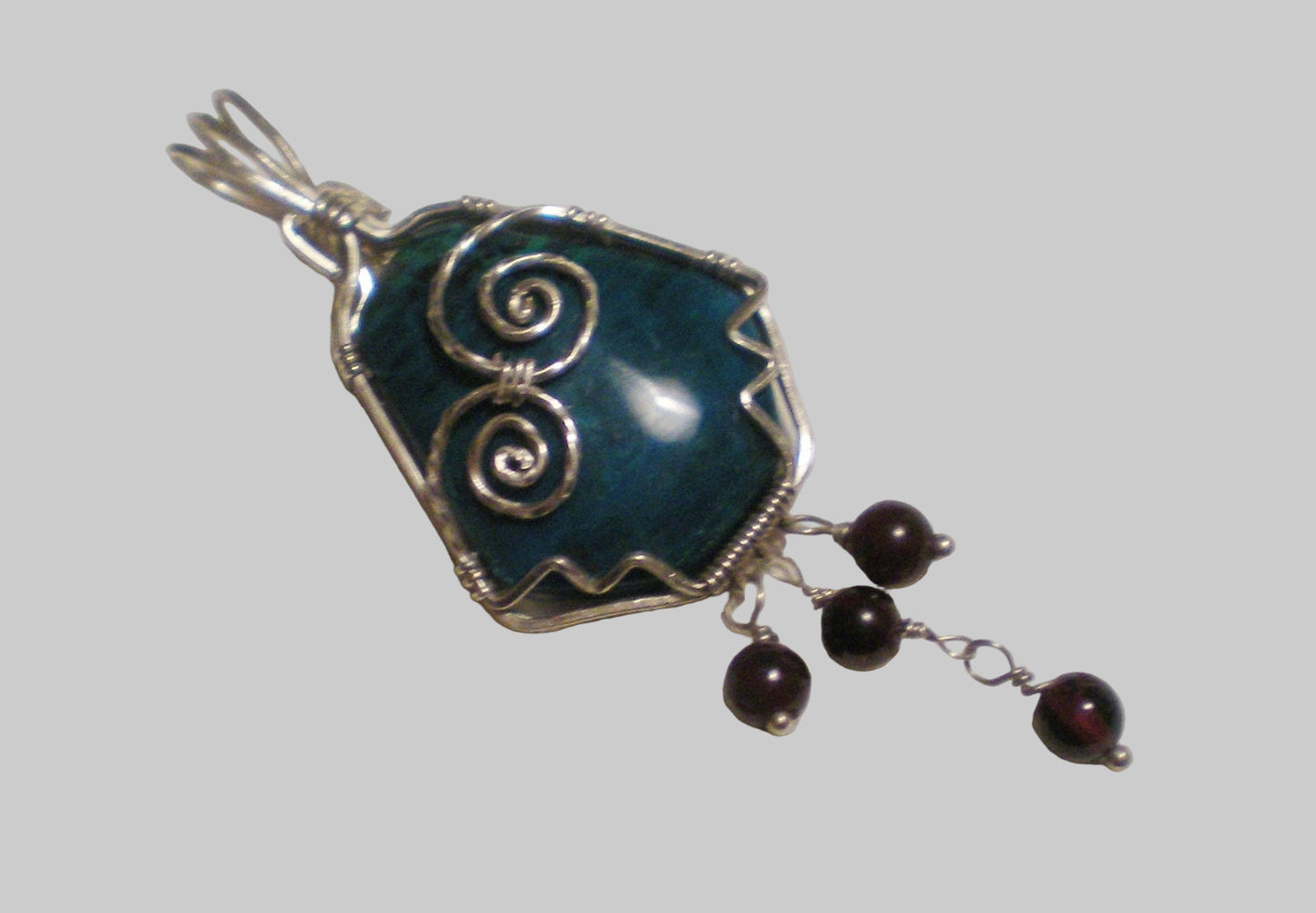 Chrysocolla and garnet sterling silver wire wrapped pendant