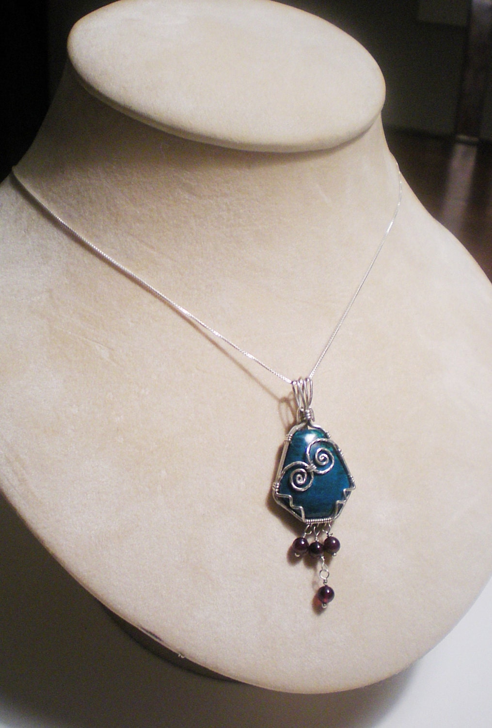 Chrysocolla and garnet sterling silver wire wrapped pendant