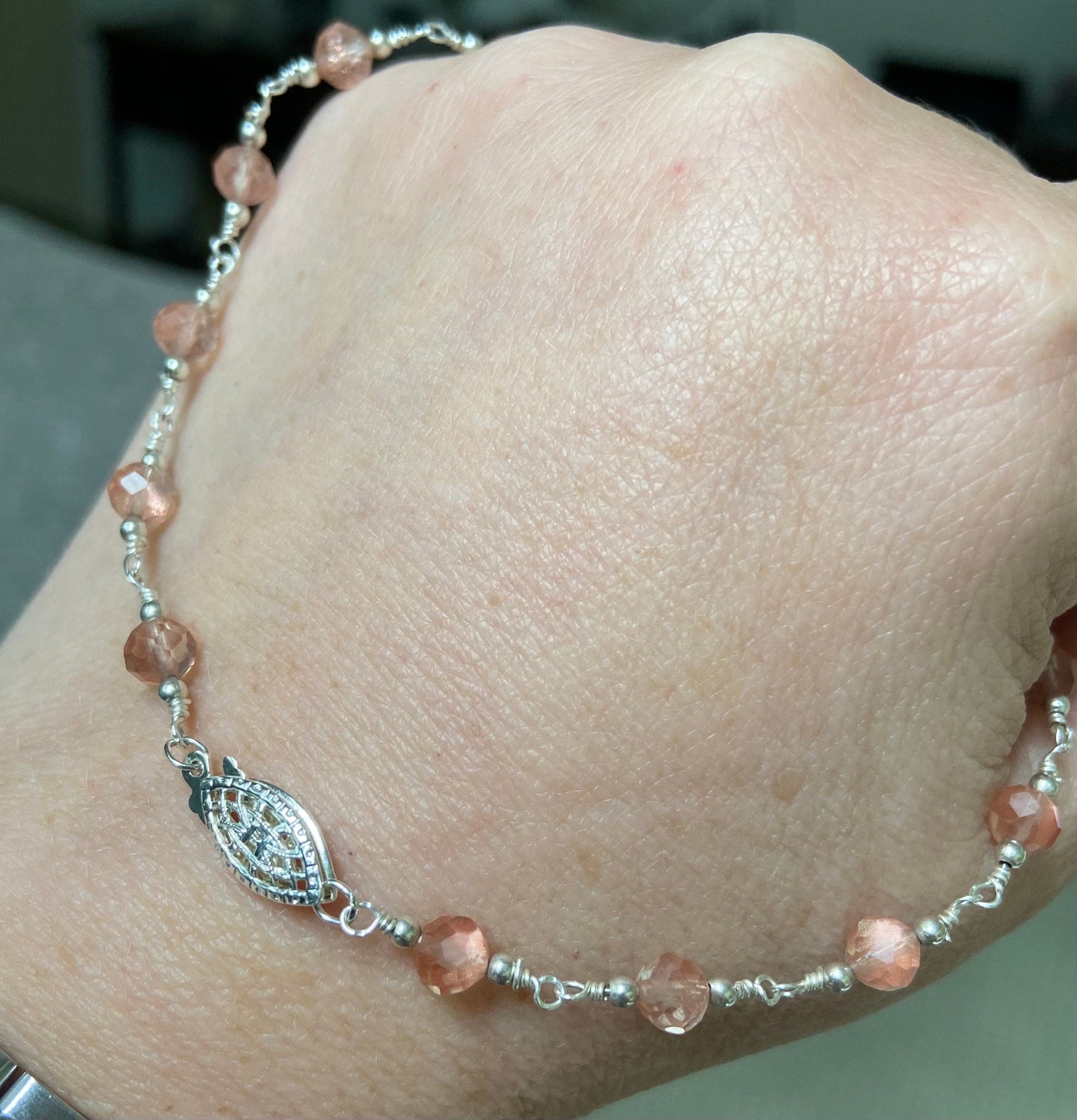 Genuine Oregon Sunstone beaded sterling silver necklace with filigree clasp.