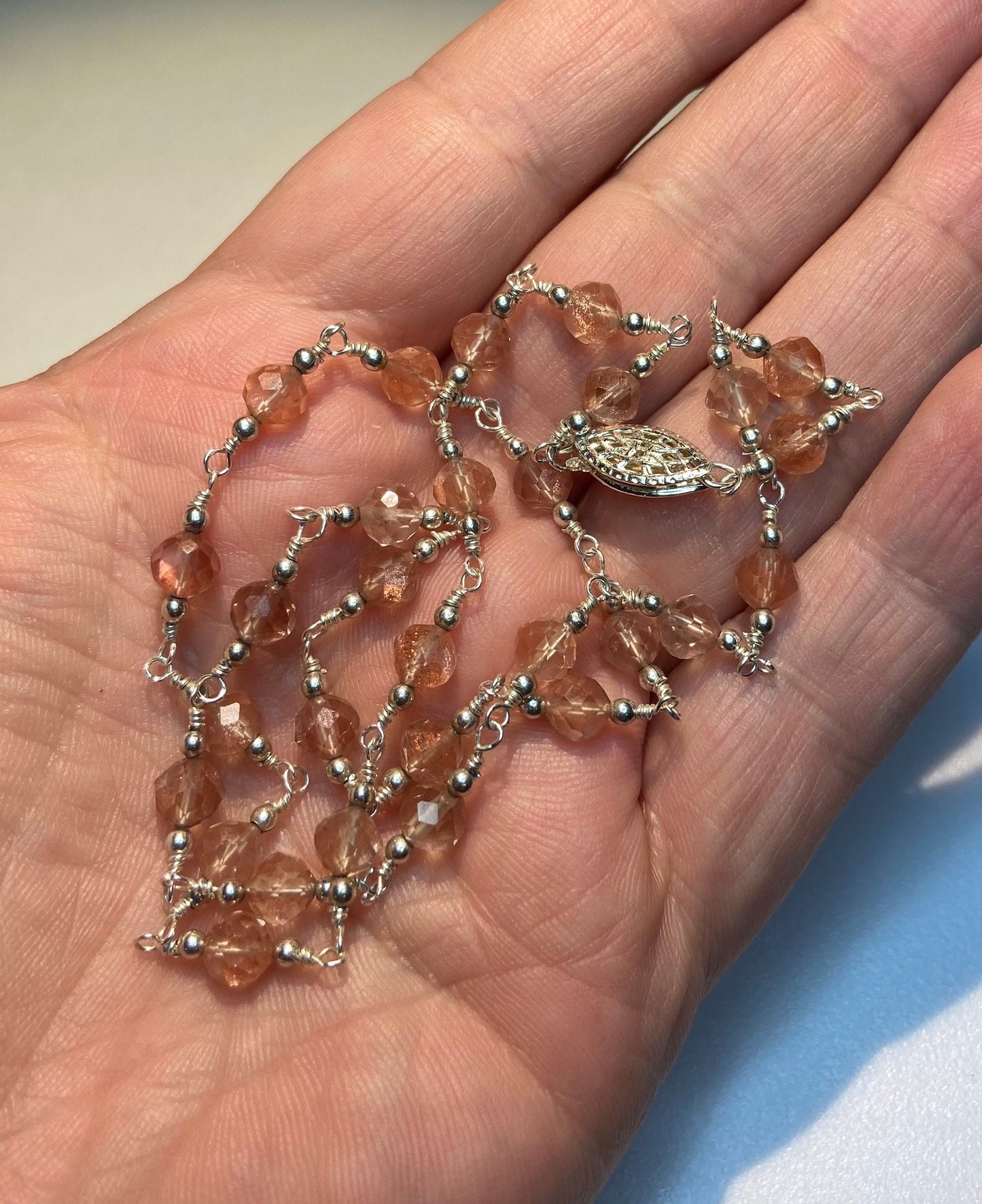 Genuine Oregon Sunstone beaded sterling silver necklace with filigree clasp.