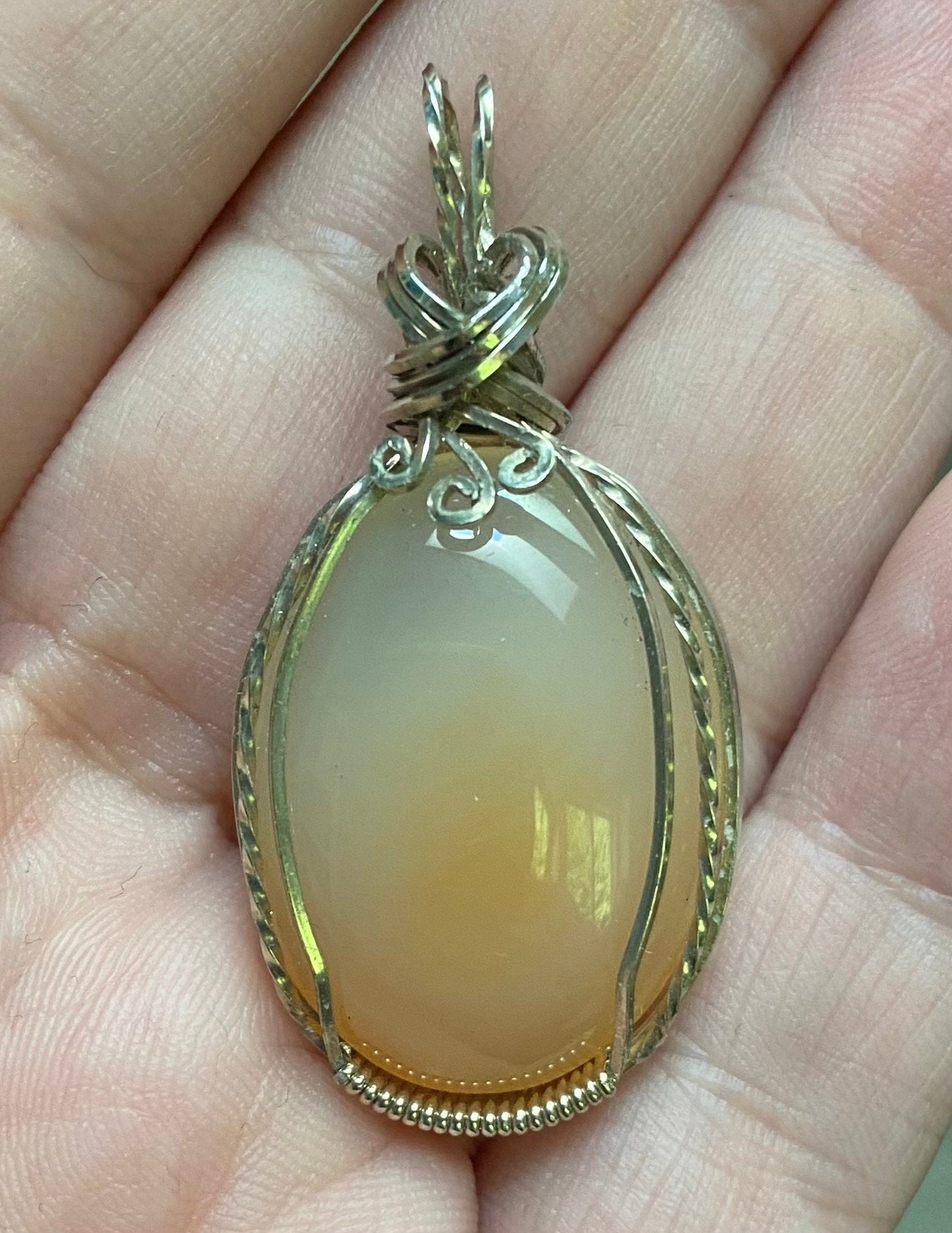 Peach Chalcedony sterling silver wire wrapped pendant
