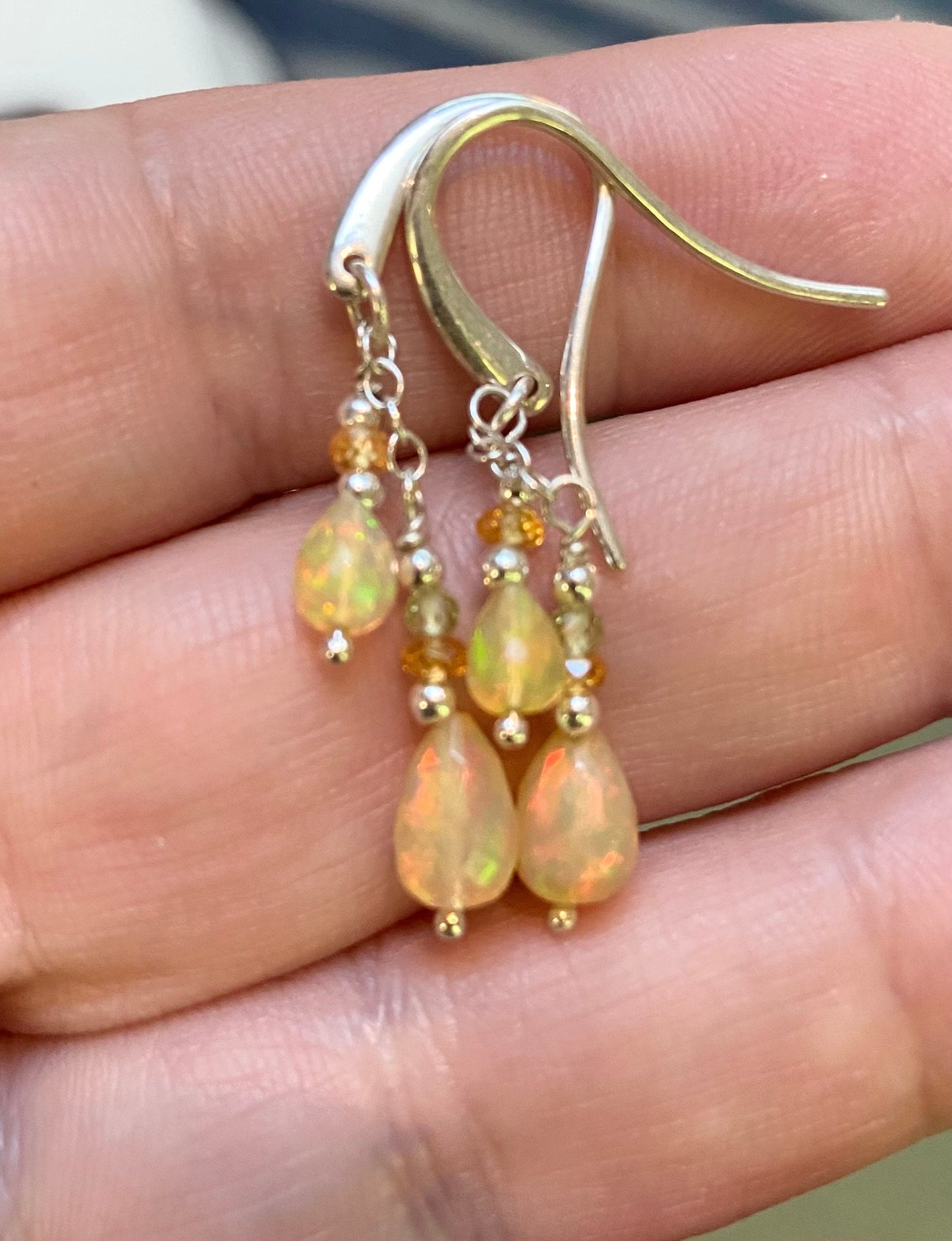 Natural Ethiopian yellow opal dangle drop earrings in sterling silver with peridot and spessartite.