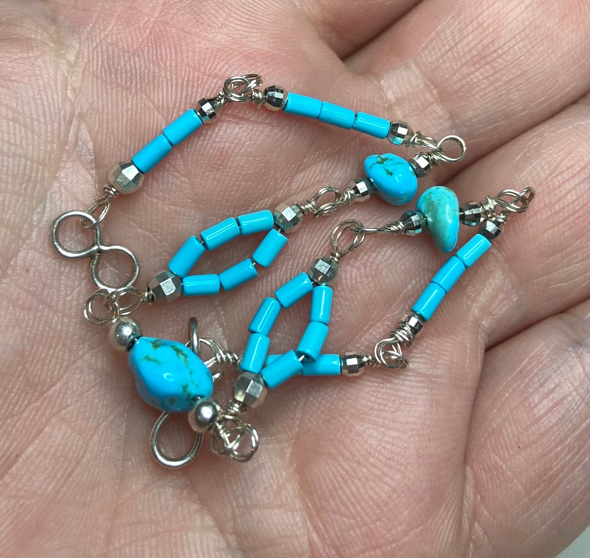 Sterling silver bracelet with Sleeping Beauty turquoise nuggets and beads.