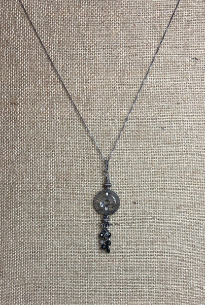Tourmilated quartz pendant necklace with tourmaline and herkimer diamond quartz.