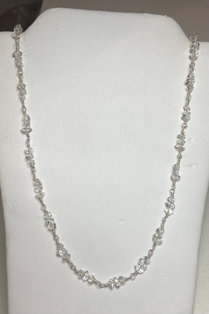 Sterling silver necklace with double terminated Herkimer diamond quartz crystals.
