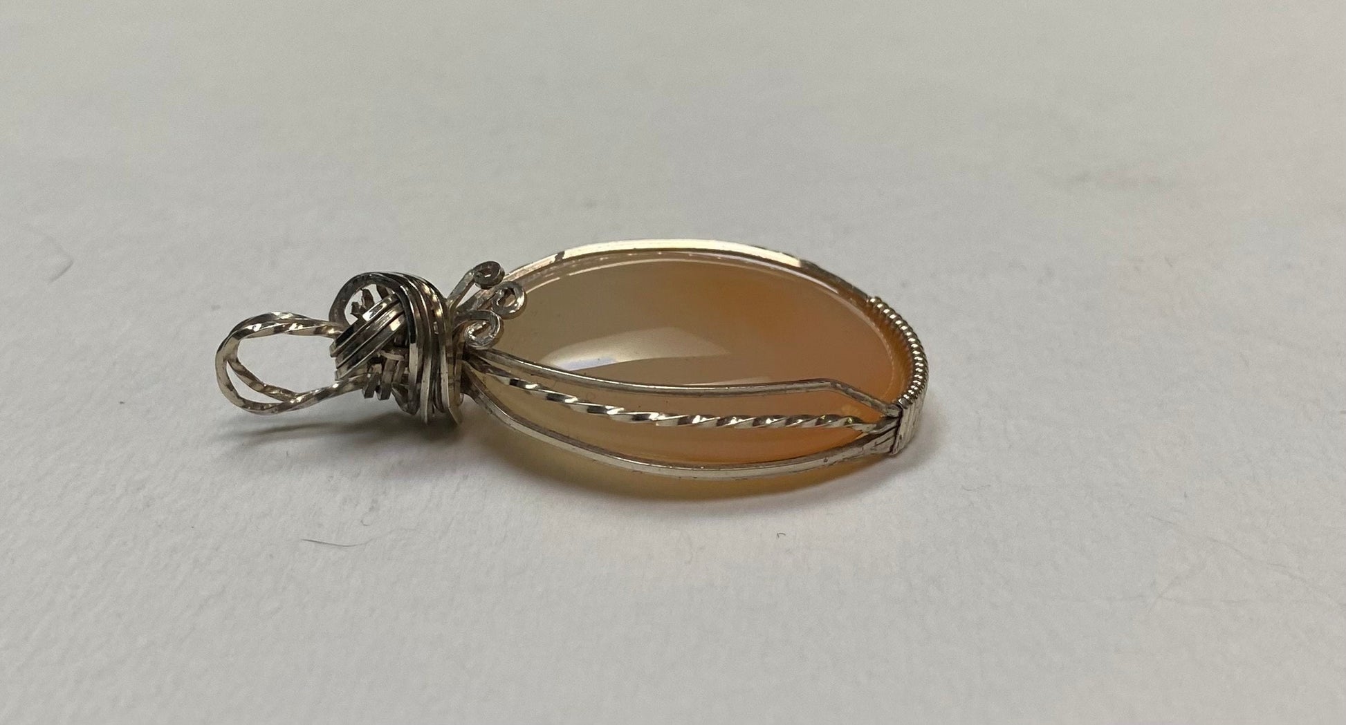 Peach Chalcedony sterling silver wire wrapped pendant