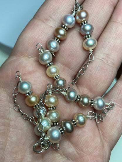 Sterling silver necklace with multi-color freshwater pearls.