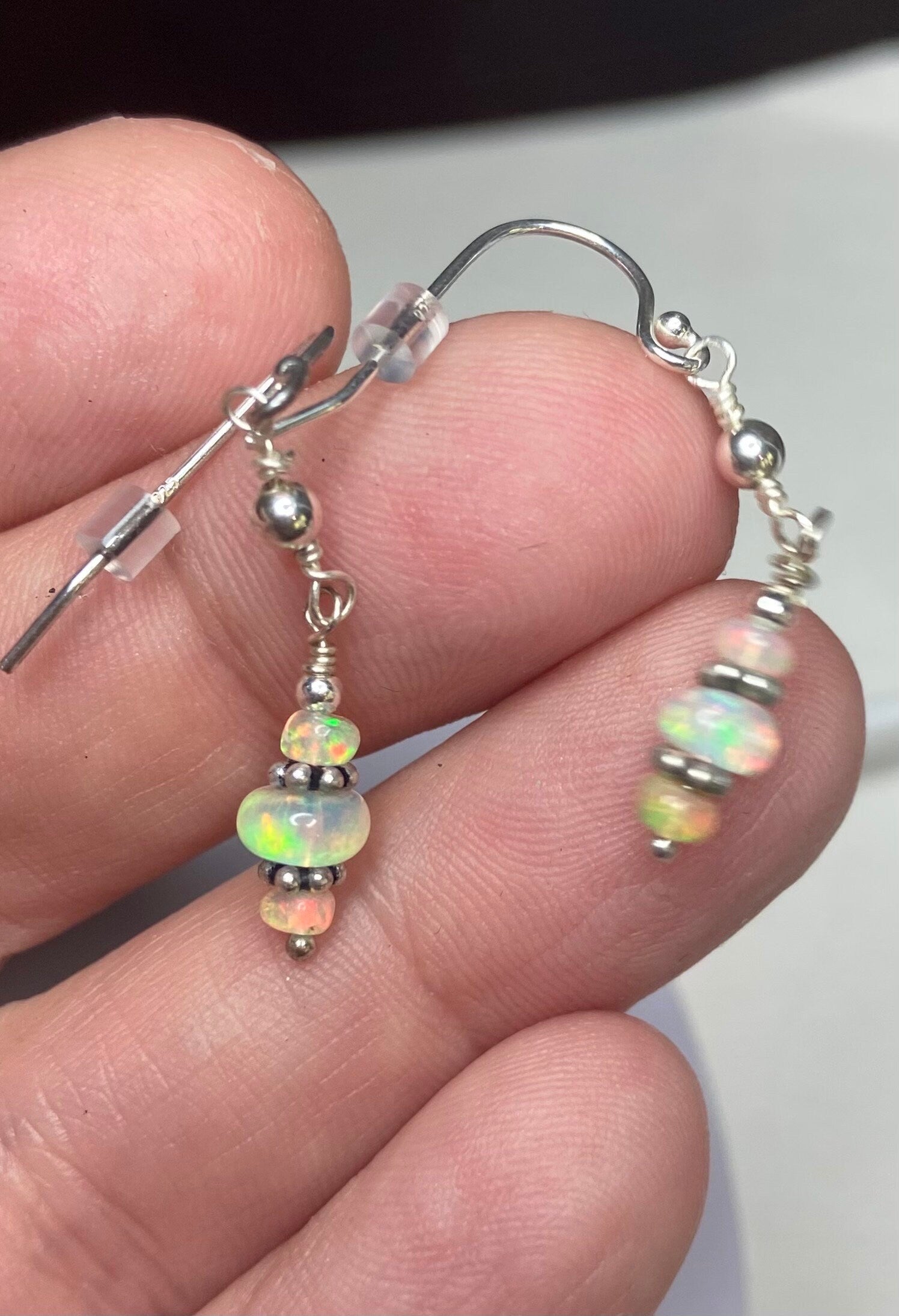 Ethiopian Wello Opal sterling silver dangle drop earrings with rondelle beads.