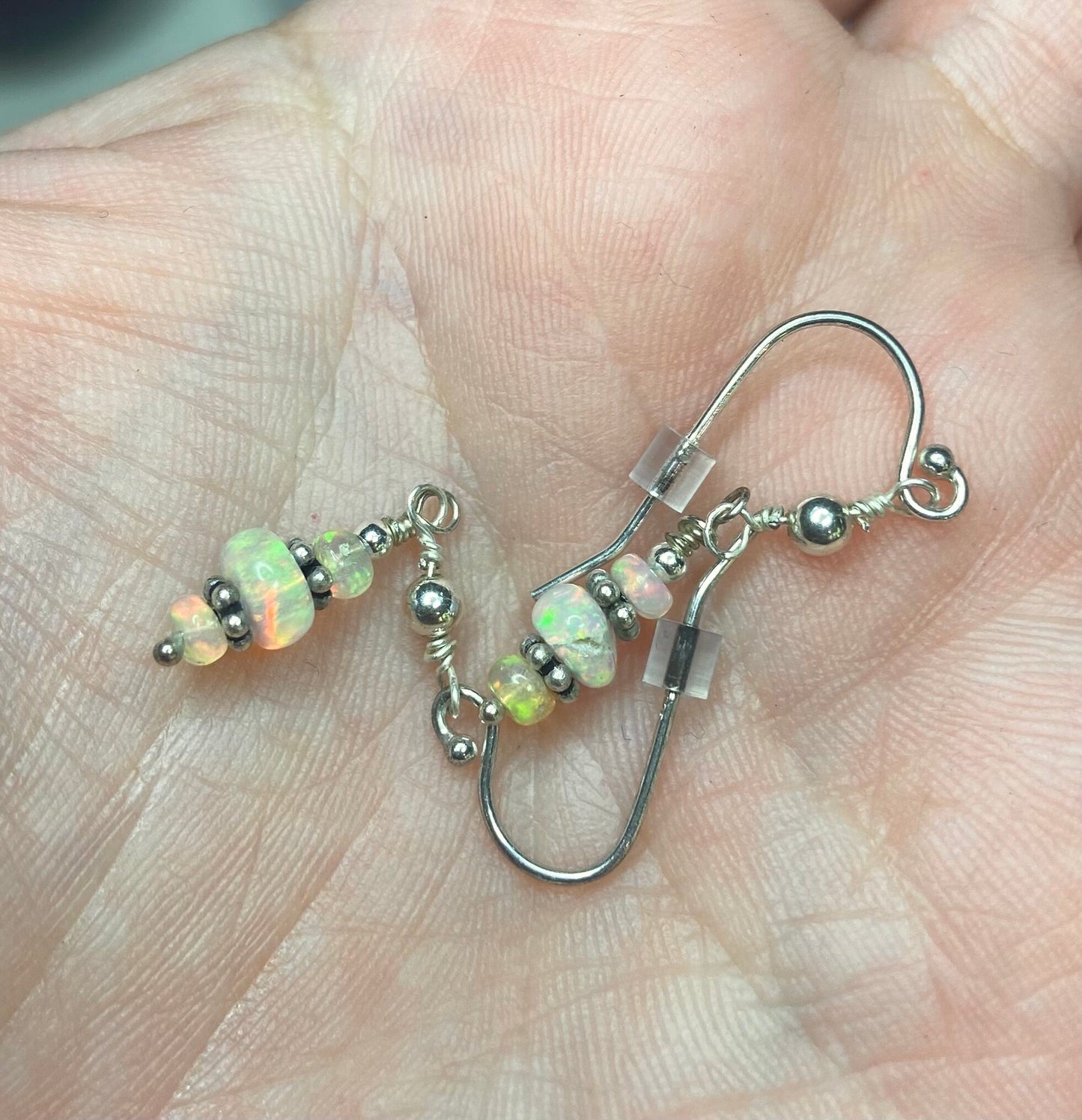 Sterling silver dangle earrings with Ethiopian Wello opal beads.