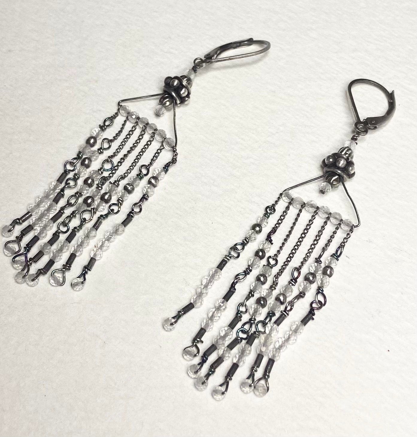 Sterling silver dangle earrings with rock crystal quartz beads and fringe.