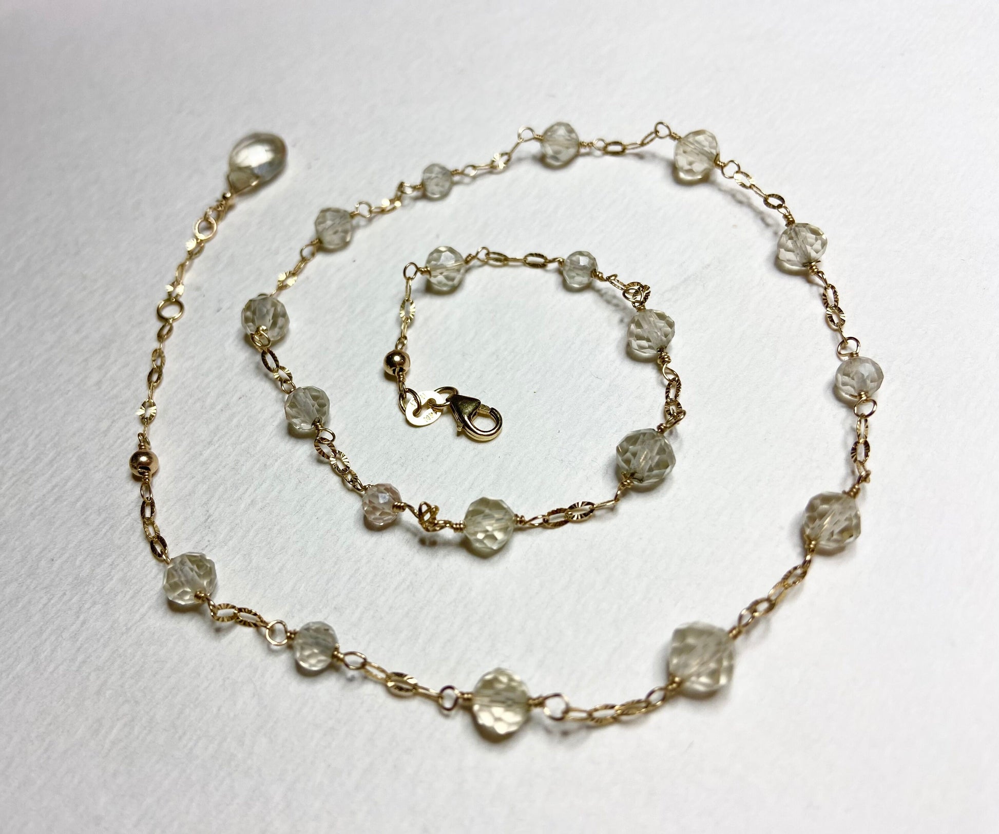 14k yellow gold choker necklace with light yellow Oregon Sunstone beads.