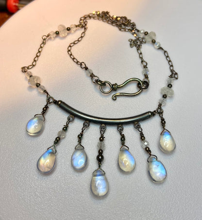 Sterling silver necklace with rainbow blue sheen moonstone teardrop beads and rondelles.