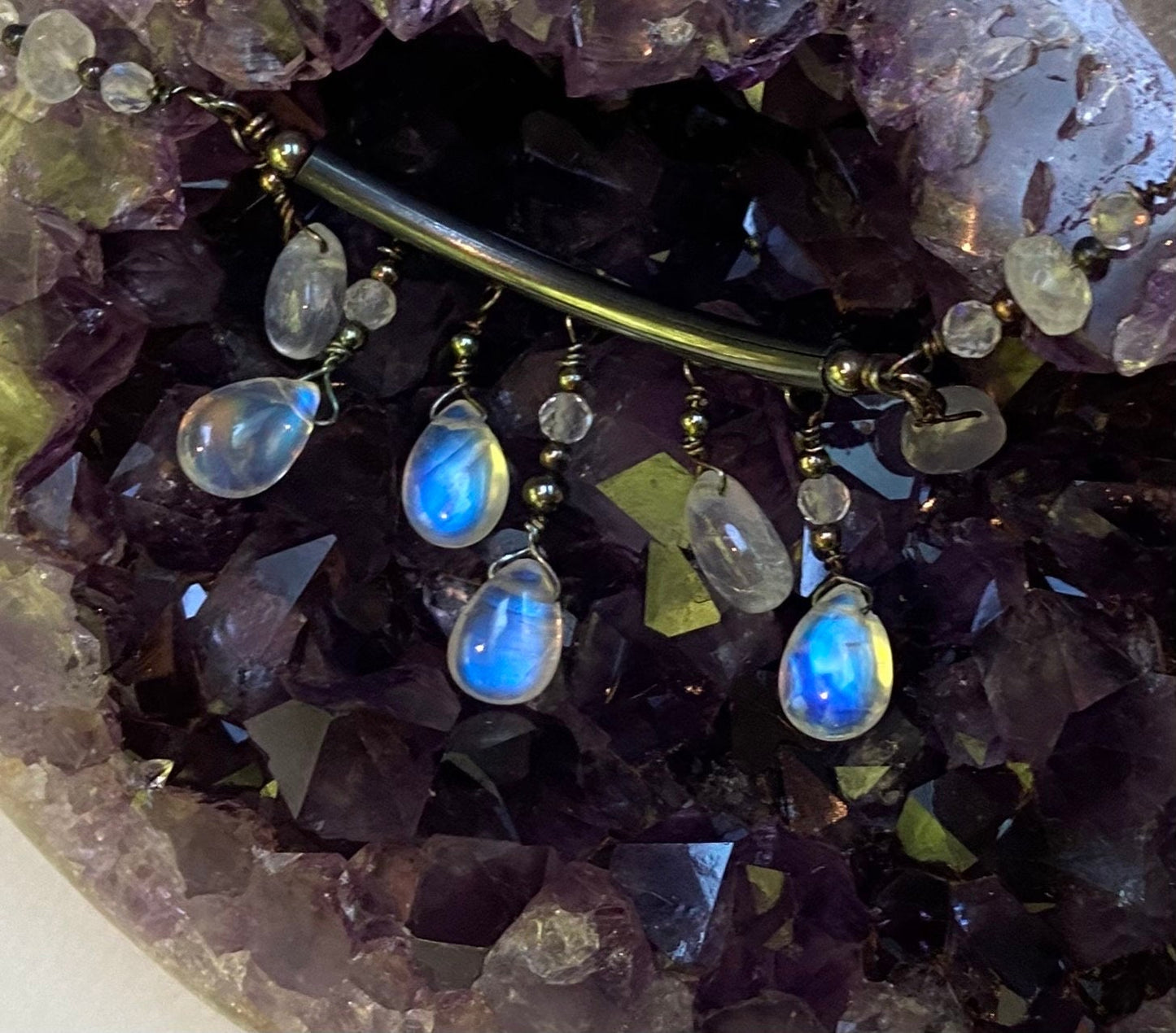 Sterling silver necklace with rainbow blue sheen moonstone teardrop beads.