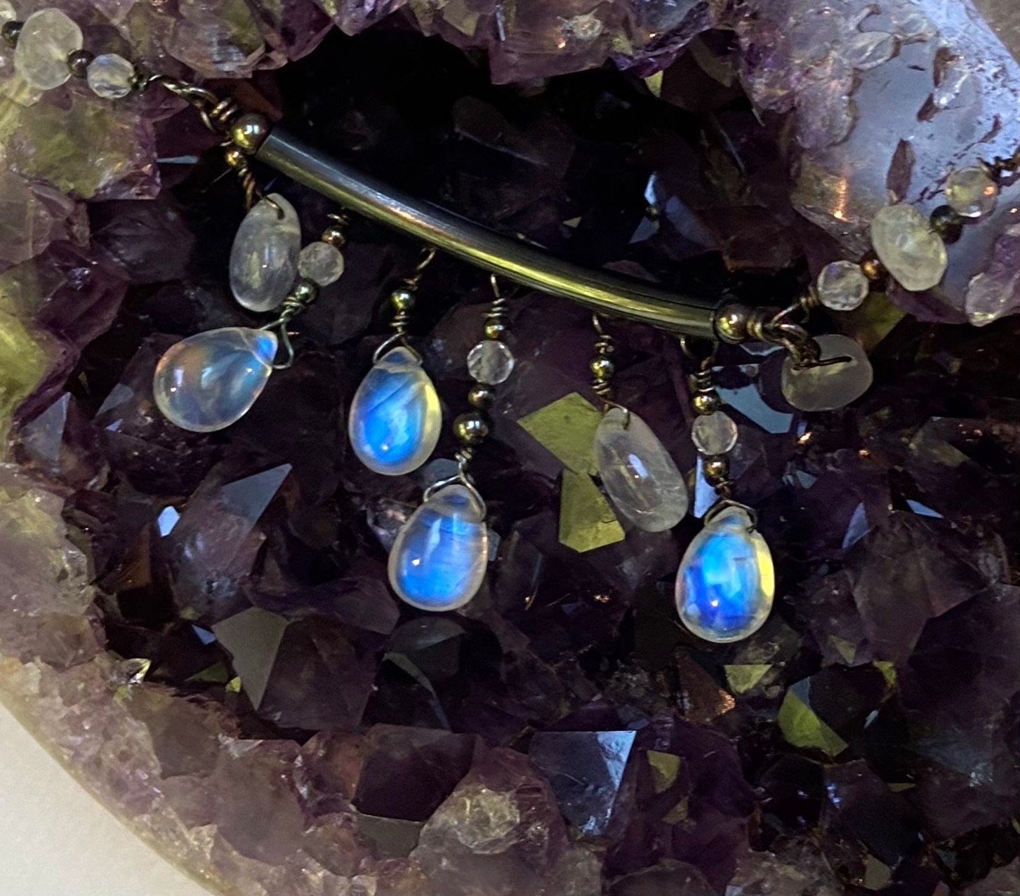 Sterling silver necklace with rainbow blue sheen moonstone teardrop beads.